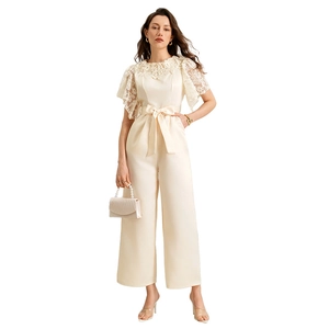 Elegant off-white short sleeve lace jumpsuit with high waist tie and wide-leg design