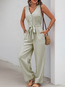 Detail of V-neck sleeveless olive stripe jumpsuit with drawstring waist and side pockets