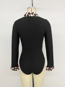 Back view of long sleeve bodysuit featuring leopard print collar and ribbed texture fabric