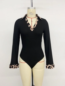 Detail of ribbed knit bodysuit featuring V-neck leopard print trim and long sleeves