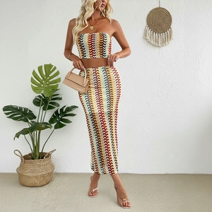 Women crochet two-piece set with colorful chevron stripe tube top and bodycon skirt