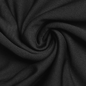 Close-up of black elastic knit fabric showing detailed fine mesh texture and soft pleats