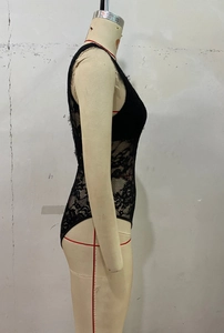 Detailed side view of black lace bodysuit with intricate floral mesh and slim fit design