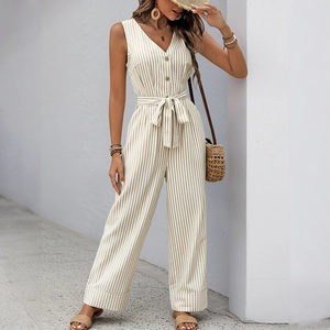 Beige striped sleeveless V-neck jumpsuit with waist tie and wide leg silhouette