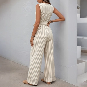 Chic beige and white vertical striped sleeveless jumpsuit with waist belt and wide leg cut