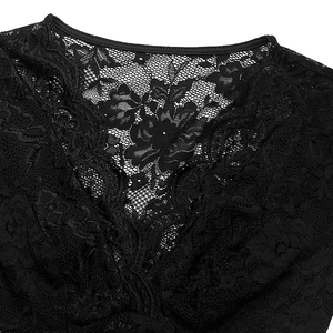 Close-up of black floral lace fabric with detailed neck edge piping on a slim bodysuit
