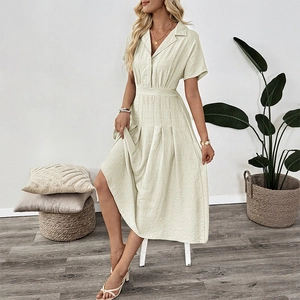 Elegant beige collared dress with waist tie and pleated skirt for summer casual wear
