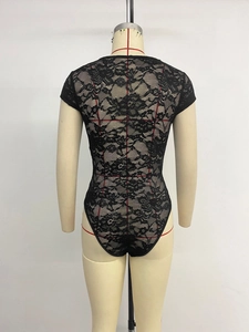 Detailed back view of a black floral lace bodysuit with short sleeves and high-cut leg line