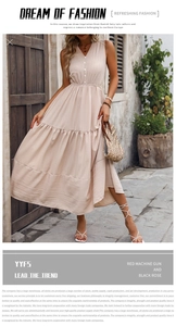 Close-up of the V-neck detail and button accents on this apricot sleeveless maxi dress
