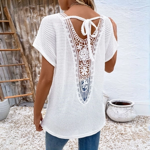 White boho crochet short sleeve top with lace V-back and delicate woven lace-up details
