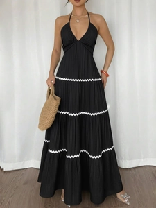 Summer halter V-neck maxi dress with black pleated fabric and white wave accents