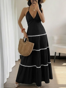 Summer halter V-neck maxi dress with black pleated fabric and white wave patterns