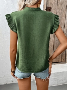 Back view of dark green textured blouse with ruffled cap sleeves and V-neck style
