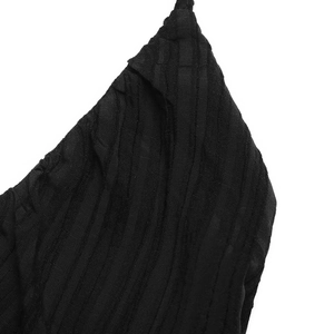 Close-up of black ribbed fabric with textured vertical stripes on summer halter dress