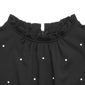 Detail view of ruffled stand collar with pearl embellishments and back zipper