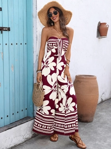 Combinaison bustier à fleurs et jambes larges avec ceinture pour vacances d'été