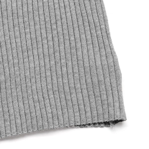 Macro shot of grey ribbed knit fabric showing detailed texture and high elasticity