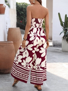 Vue arrière d'une combinaison bustier fleurie avec jambes larges et motifs de fleurs blanches