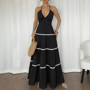 Elegant black halter maxi dress with white wavy lace trim and layered tiered skirt design