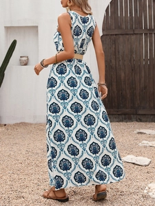 Detail of bohemian V-neck sleeveless dress with blue and white mandala floral print