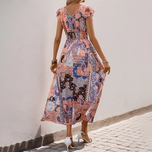 Bohemian paisley print midi dress with flutter sleeves and open back design