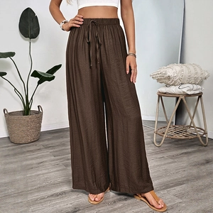 Women's dark brown wide leg trousers with elastic drawstring waist and lightweight texture