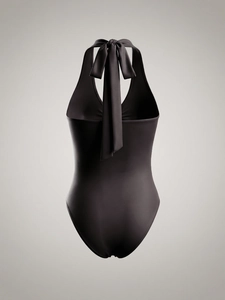Slim fit black halter neck bodysuit with open back design and neck tie detail for women