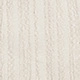 Detailed close-up of cream textured fabric with vertical wavy patterns and fine stitching