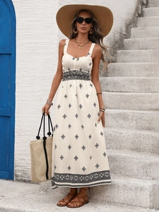 White Bohemian maxi dress with black geometric floral print and square neckline