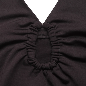 Close-up of black sleeveless bodysuit featuring deep V-neck and ruched ring cutout detail
