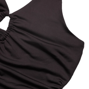 Detailed macro shot of the ruching and pleated texture on the dark brown bodysuit fabric