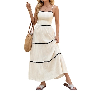Summer cream tiered maxi dress with thin straps and black scalloped lace trim details