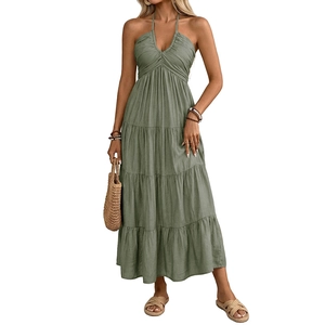 Summer halter maxi dress in sage green with tiered cake skirt and open back design