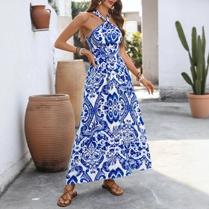 Vintage blue floral halter maxi dress with backless cross-neck and large A-line hemline