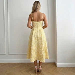 Elegant pale yellow jacquard midi dress with thin straps and a chic A-line silhouette
