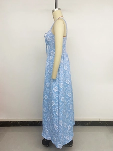 Detailed view of light blue jacquard dress featuring 3D floral embroidery and elastic back