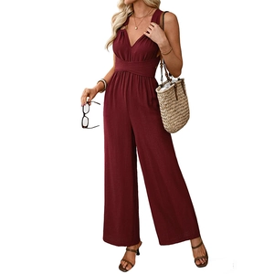 Elegant burgundy sleeveless wide-leg jumpsuit with V-neck and crisscross waist tie detail