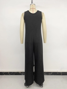 Back view of a casual sleeveless high waist wide leg black jumpsuit with U-neck