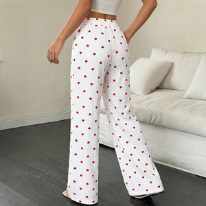 Pantaloni a gamba larga a vita alta da donna con stampa a cuori rossi per l'estate