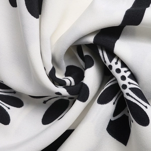 Macro detail of high-quality floral print fabric on retro strapless dress material