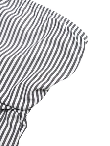 Close-up of high-quality black and white striped woven fabric showing fine textile texture