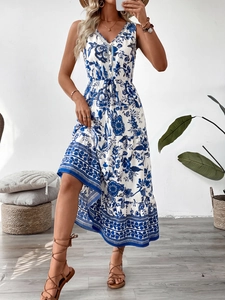 Detail of V-neck floral maxi dress featuring a tiered skirt and drawstring waist