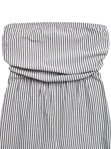Detail of elastic tube top with vertical black and white stripes on cotton fabric