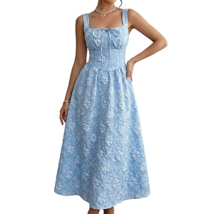 Elegant light blue midi sundress with floral jacquard texture and bow tie detail