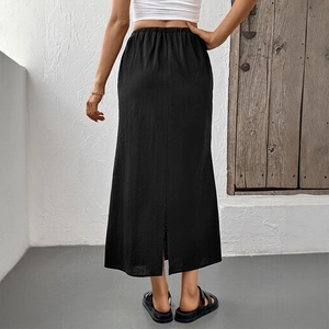 Women's minimalist black midi skirt with elastic waist and stylish back slit detail