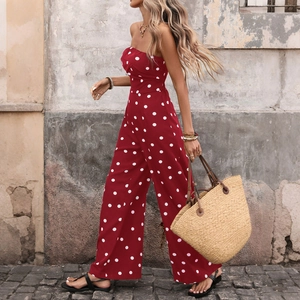 Combinaison rétro à pois rouges et blancs sans bretelles avec pantalon large fluide