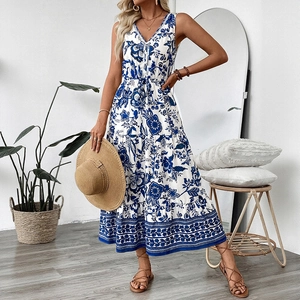 Elegant sleeveless V-neck maxi dress with blue floral print and drawstring waist