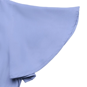 Close-up of elegant lavender dress featuring ruffled butterfly sleeves and stitched edges