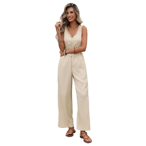 Women's beige sleeveless jumpsuit with deep V-neck, waist drawstring and wide leg cut