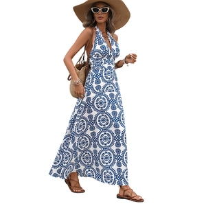Bohemian blue and white floral halter maxi dress with waist tie for summer beach vacations